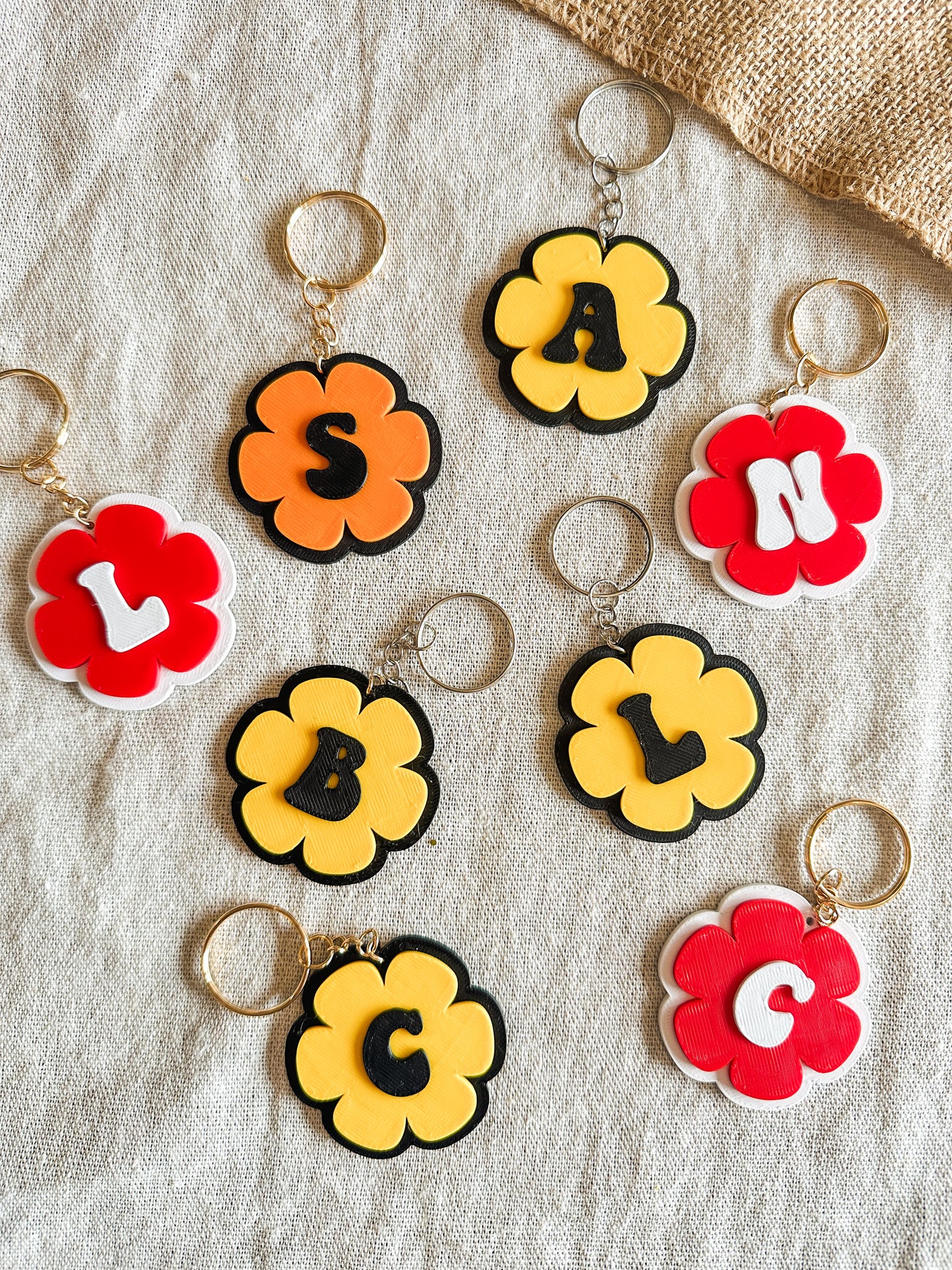 Llaveros personalizados inicial 🌼