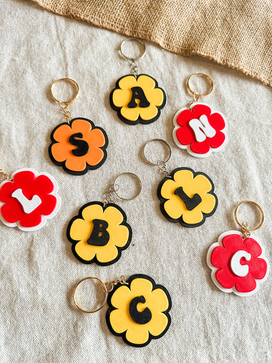 Llaveros personalizados inicial 🌼